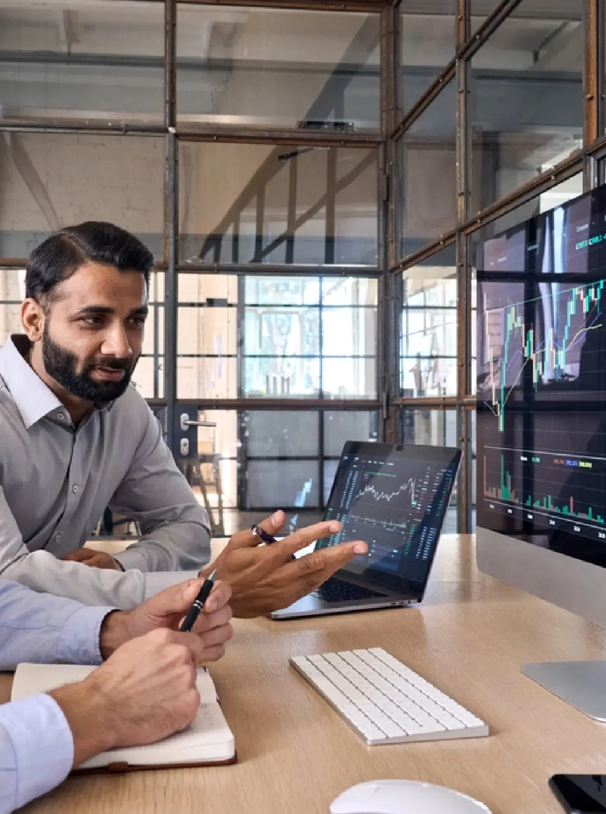 two-people-discussing-in-office